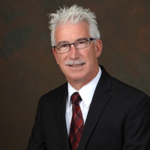 headshot of Denis Goulet