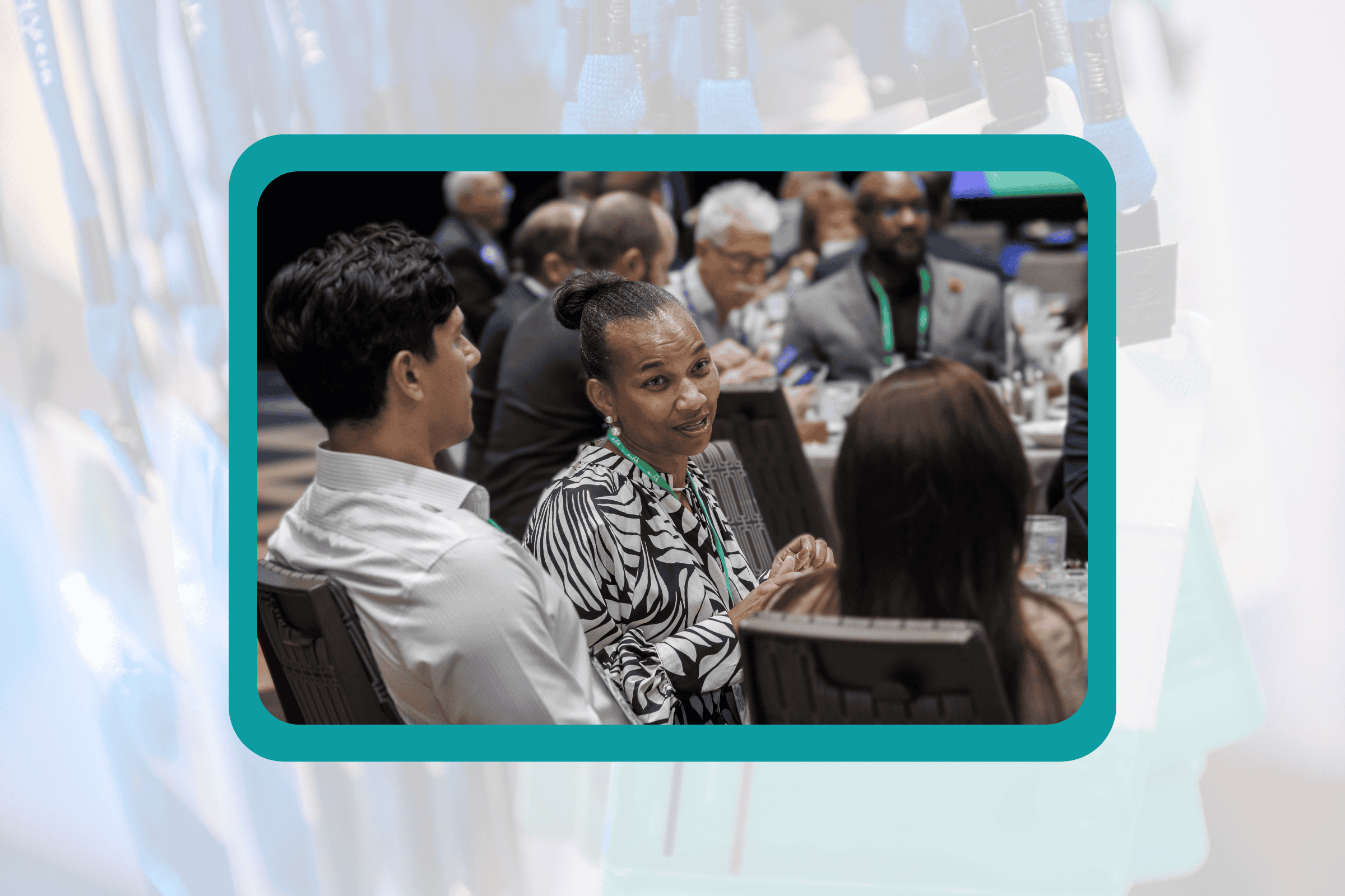 Attendees talking during a meal