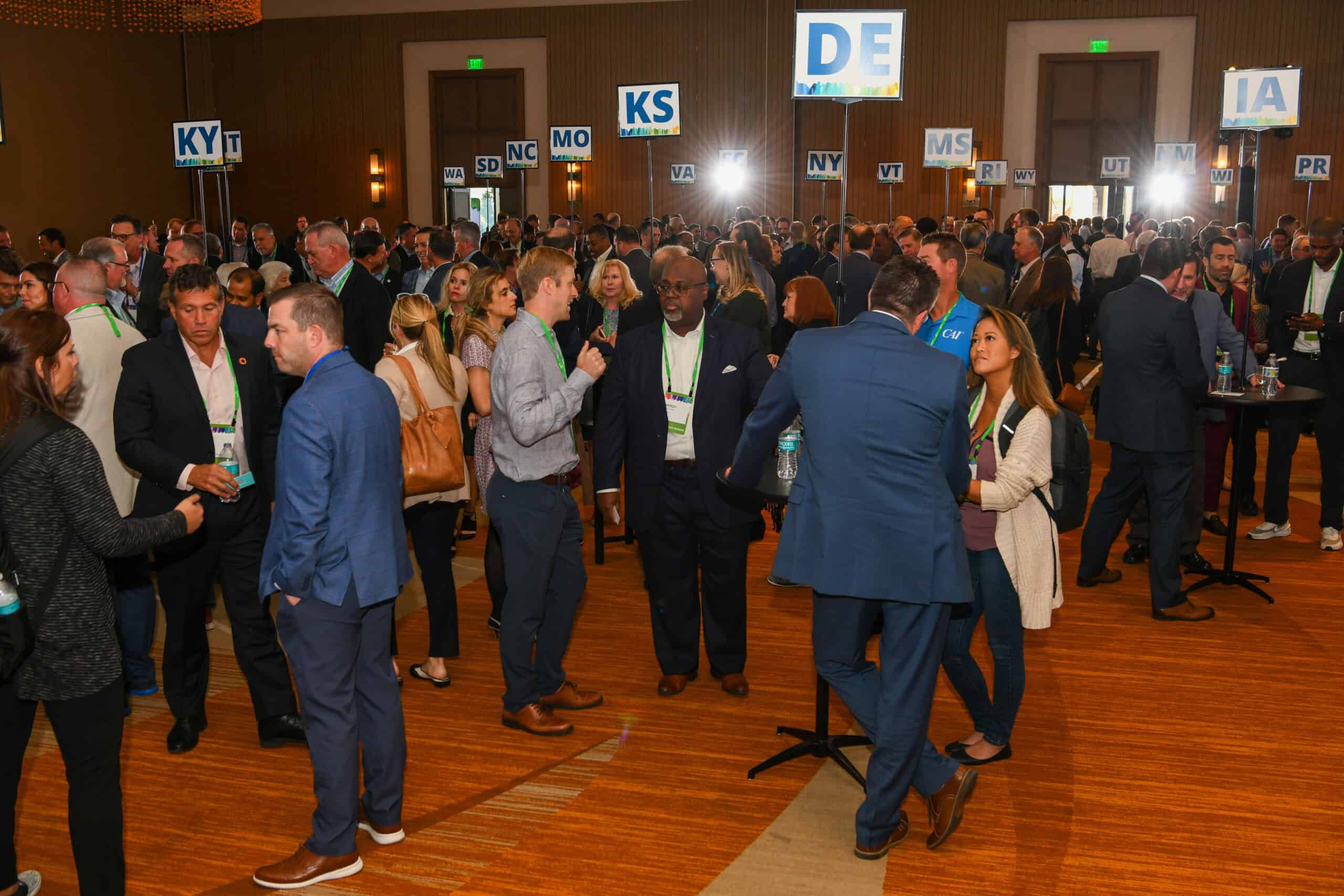 Attendees meeting state representatives